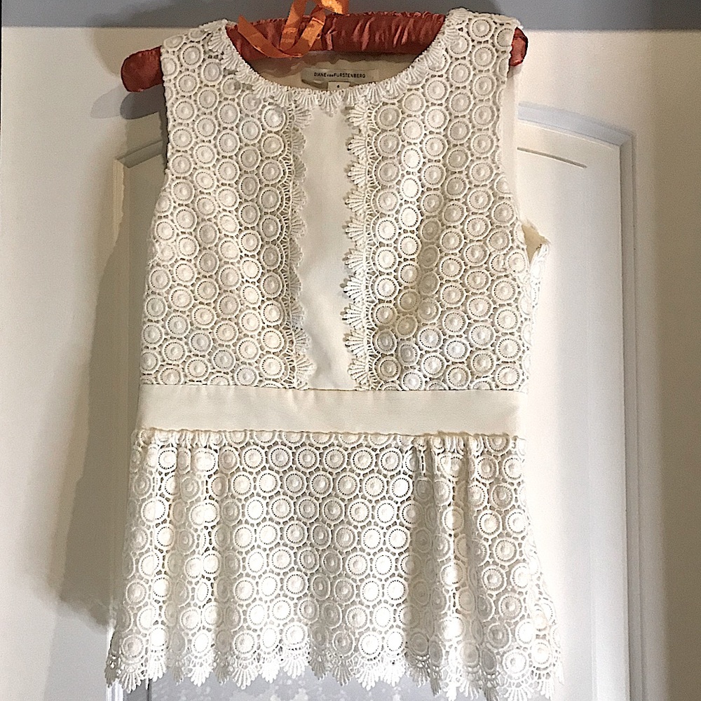 Diane Von Furstenburg white eyelet peplum top. Size 6.